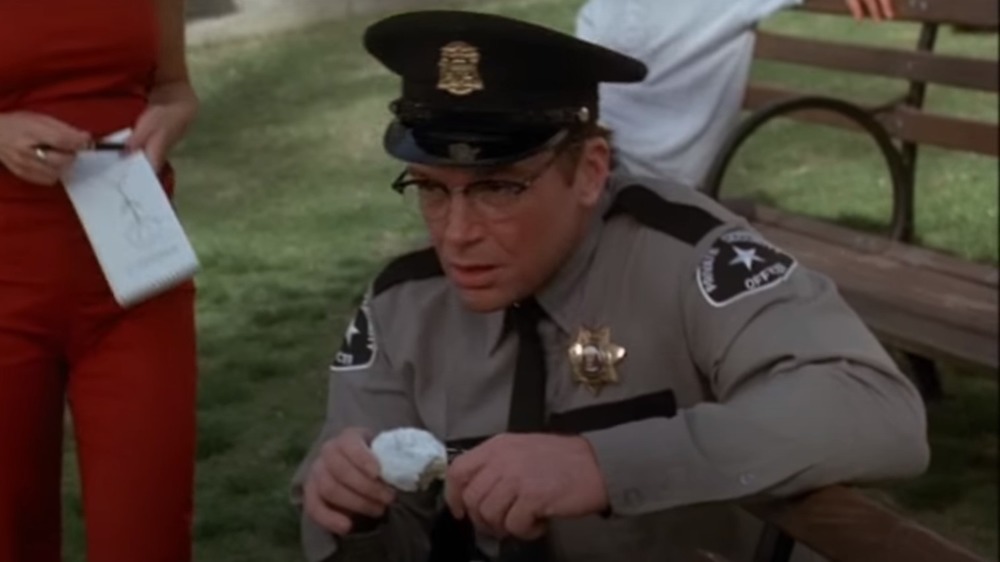 Tom Arnold dressed as cop