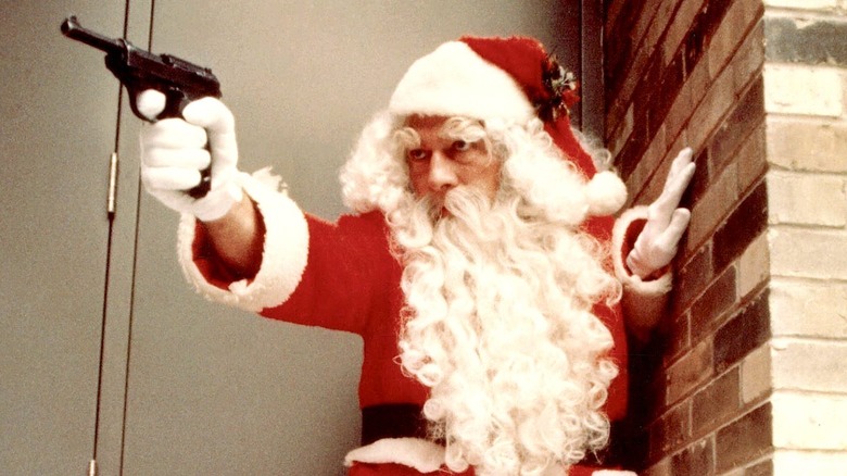 Harry in a Santa outfit points a gun in "The Silent Partner" (1978)