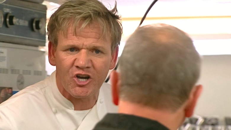 Chef Gordon Ramsay yelling at an owner at Mill Street Bistro in Kitchen Nightmares