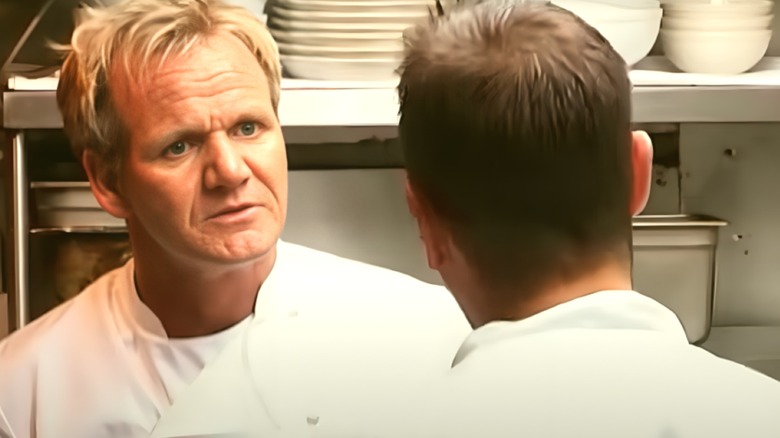 Chef Gordon Ramsay angrily leering at a man at Oceana in Kitchen Nightmares