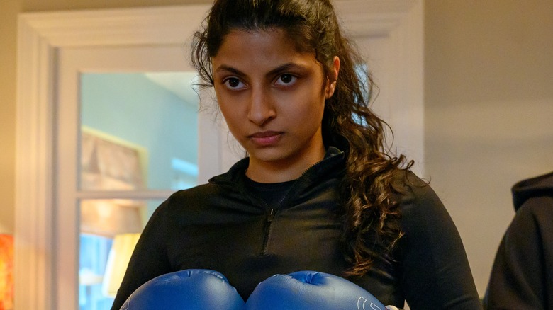 Ria wearing boxing gloves