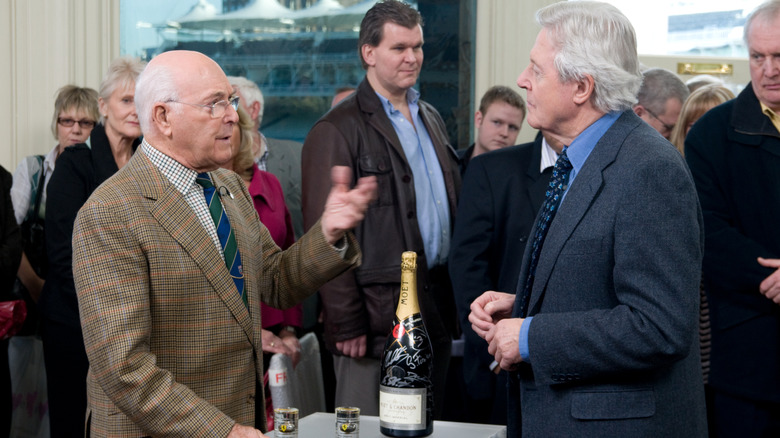 Antiques Roadshow appraising a signed bottle of wine