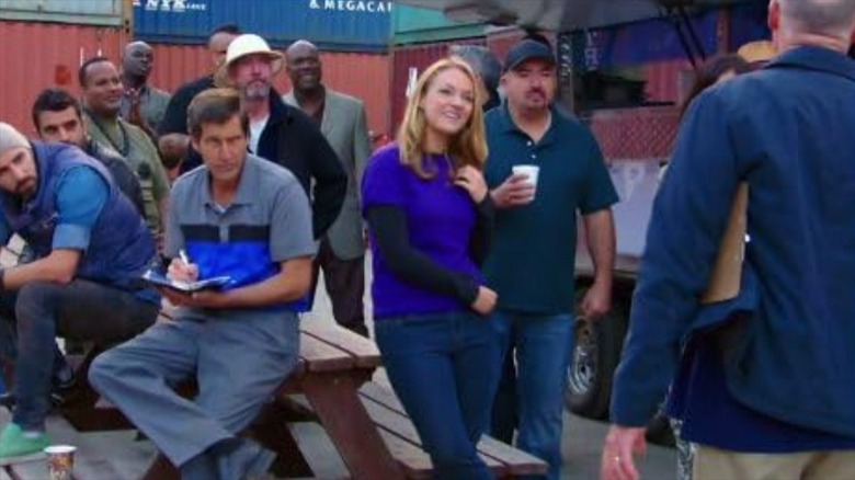 Bidders outside a shipping container yard on Container Wars