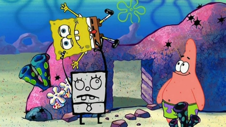 Frankendoodle version of SpongeBob holding SpongeBob up with one hand while Patrick Star looks on amused on SpongeBob SquarePants