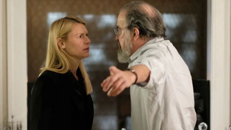 Carrie standing and grimacing while Saul, her superior/mentor, points off-camera and speaks angrily in "Homeland"