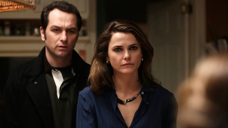 Philip and Elizabeth Jennings standing side by side in "The Americans."