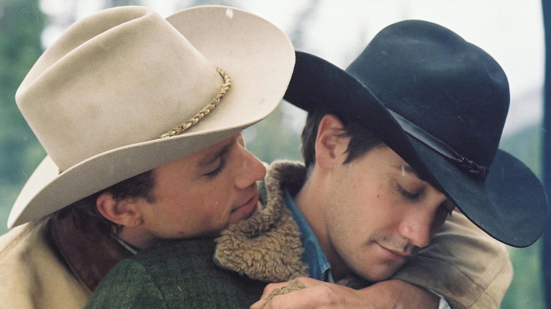 Heath Ledger holding Jake Gyllenhaal in "Brokeback Mountain"