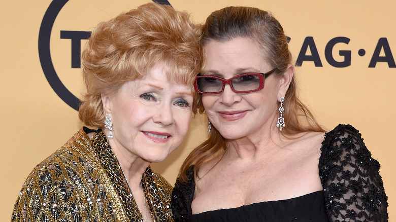 Debbie Reynolds and Carrie Fisher smiling