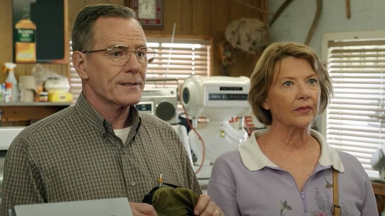 Bryan Cranston and Annette Bening watching