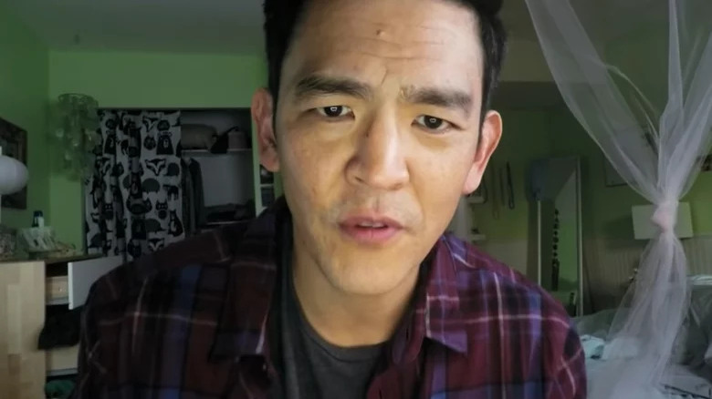 John Cho upset looks at camera