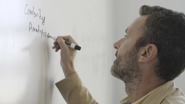 Man writing whiteboard