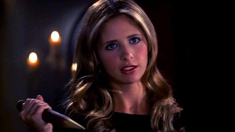 Buffy holds a stake