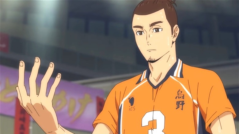 Asahi looking at his hand