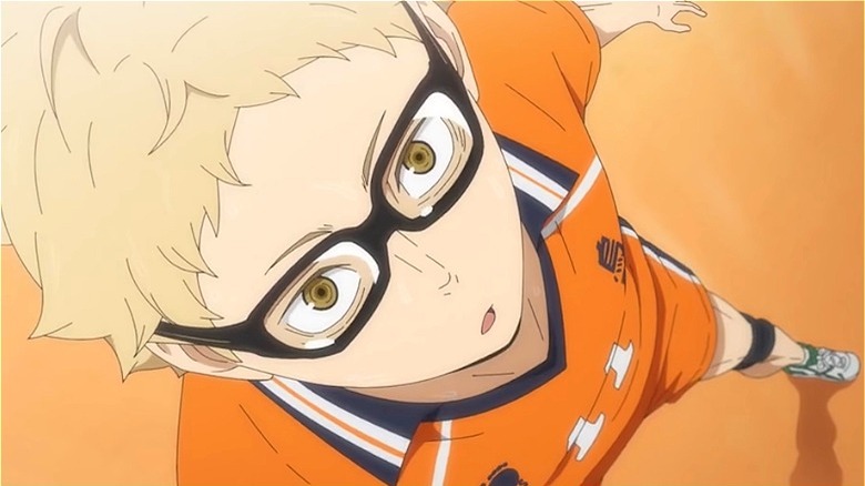 Tsukishima wearing glasses on court