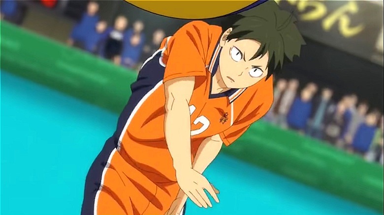 Tadashi Yamaguchi serving on court