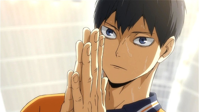 Tobio Kageyama concentrating and sweating