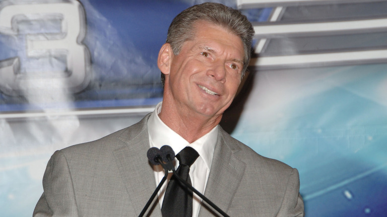 Vince McMahon talking at podium