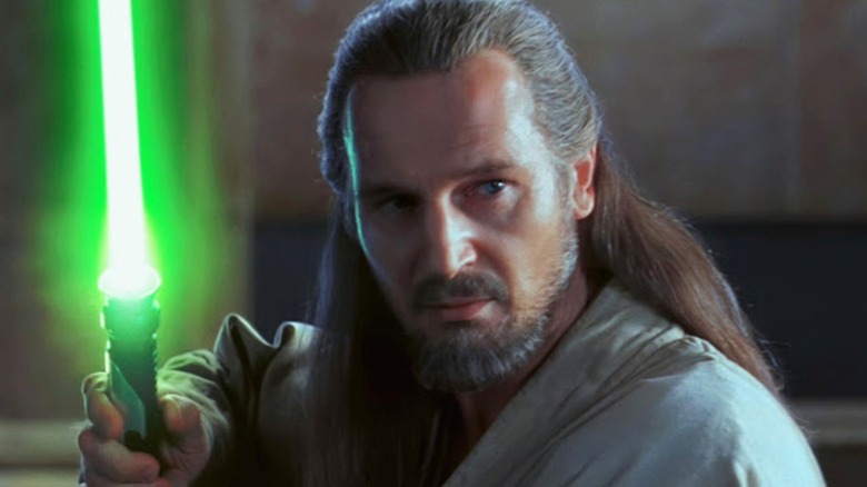 Jedi Master Qui-Gon Jinn wielding his lightsaber in Star Wars The Phantom Menace