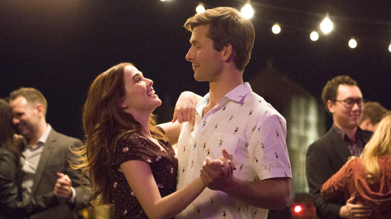 Harper and Charlie dancing on a roof top in "Set It Up."