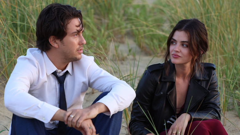 Will and Jane sitting on the beach in "Which Brings Me to You."