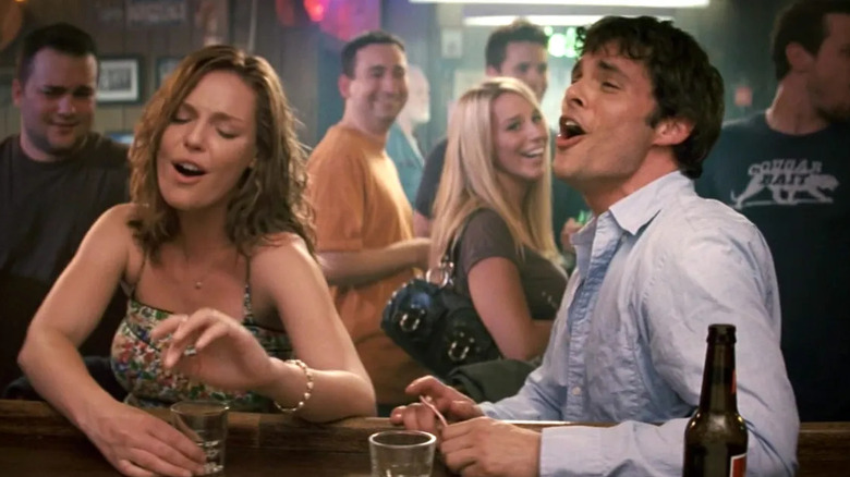 Jane and Kevin singing Benny and the Jets at a bar in 27 Dresses