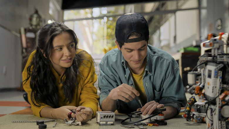 Valeria and Alex working on a robot in "Anonymously Yours"