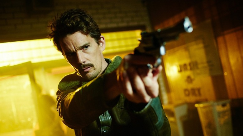 Agent Doe aims a gun in "Predestination" (2014)