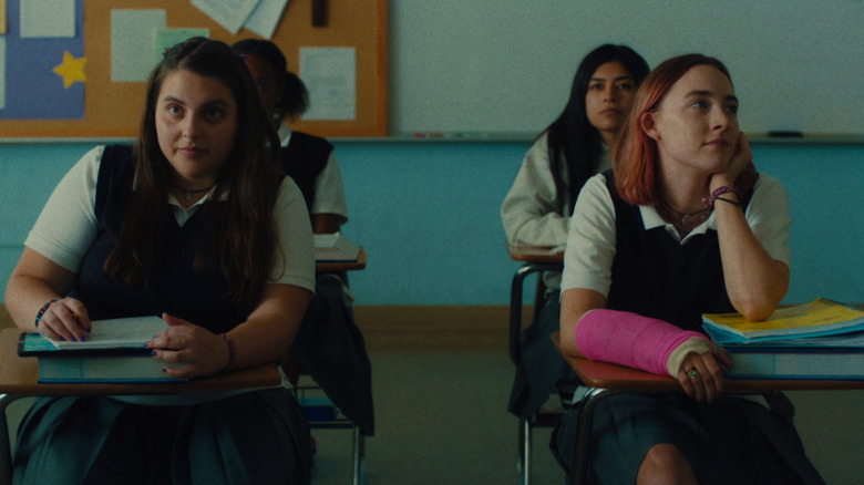 Julie and Lady Bird sit in a classroom in "Lady Bird" (2017)