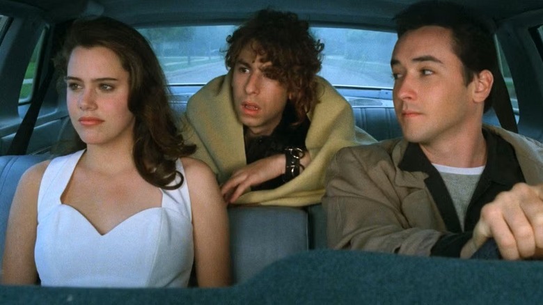 Diane, Mike, and Lloyd ride in a car in "Say Anything" (1989)