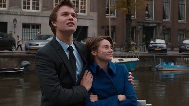 Gus and Hazel stand near a river in "The Fault in Our Stars" (2014)