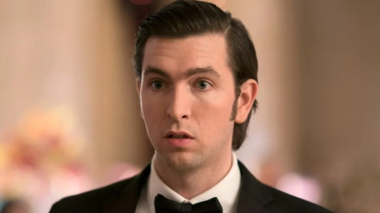 Nicholas Braun plays Cousin Greg