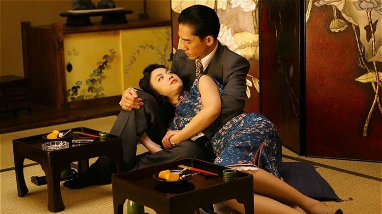 Wei in Leung's lap in lust, caution