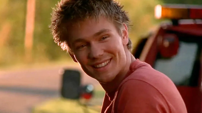 Lucas smiling in "One Tree Hill"