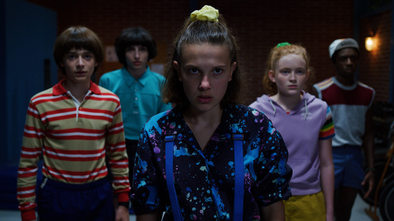 Eleven protects her friends