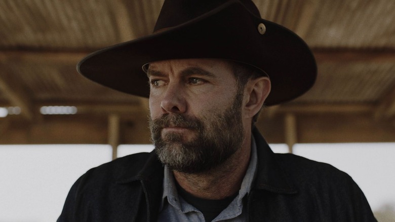 John stands thoughtfully in a cowboy hat on "Fear the Walking Dead" (2018)