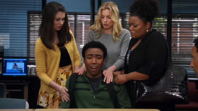 Annie, Britta, and Shirley comforting Troy