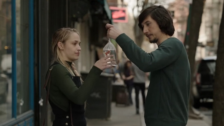 Jessa and Adam holding goldfish