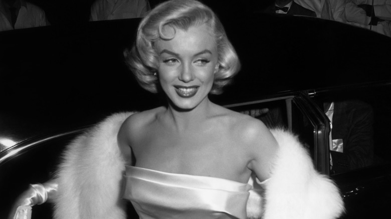 Black-and-white photo of Marilyn Monroe at the 1954 premiere for "There's No Business Like Show Business"