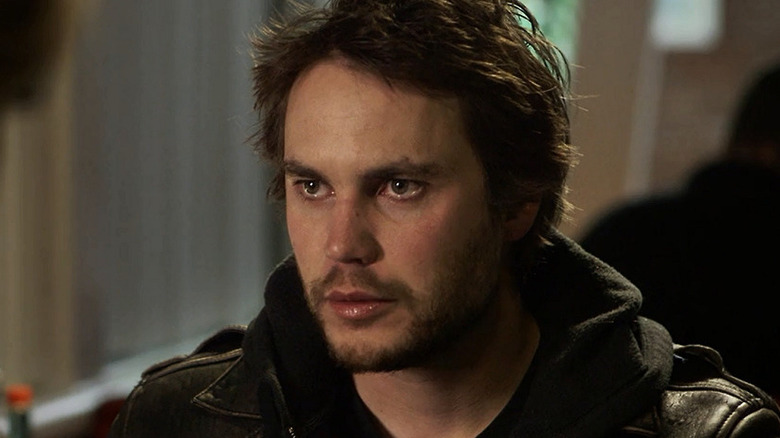 Taylor Kitsch staring