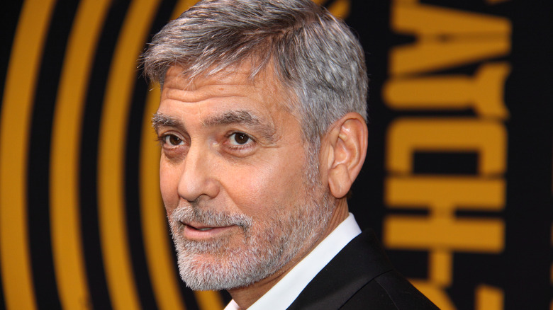 George Clooney smiling in suit