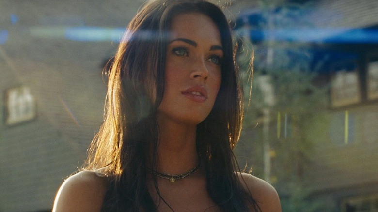 Megan Fox looks off to side