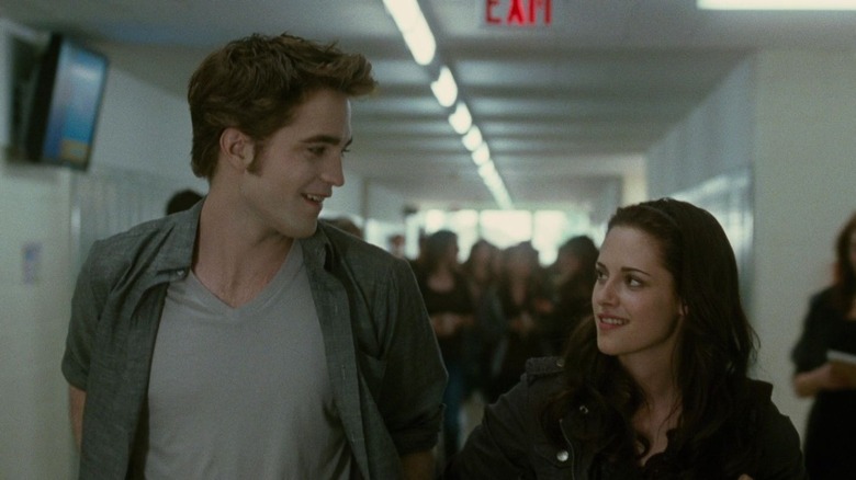 Edward and Bella walking through school