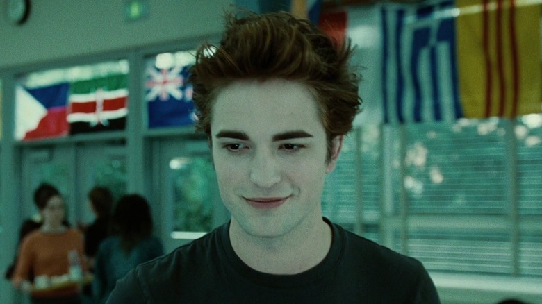 Edward Cullen smiling in cafeteria