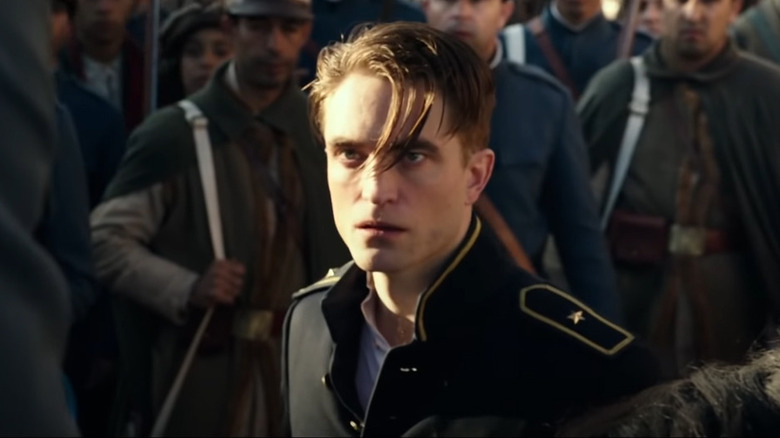 Robert Pattinson as Officer Mandel