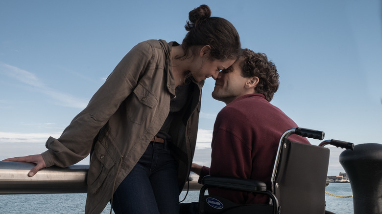 Erin and Jeff Bauman embrace in "Stronger" (2017)