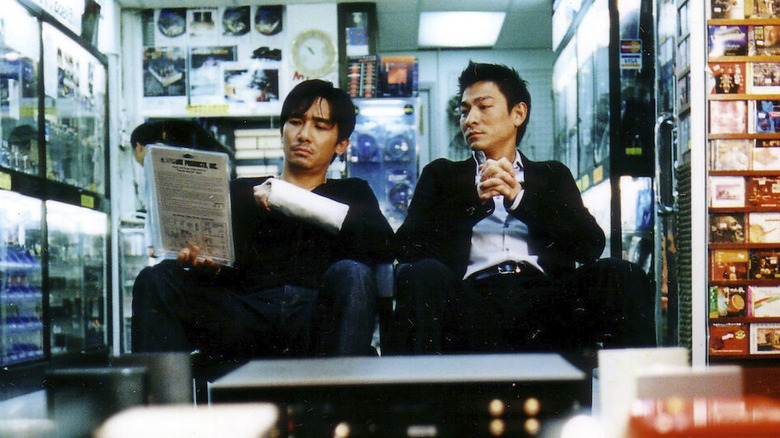 Inspector Lau Kin Ming and Chen Wing Yan meeting in an audiophile shop in "Infernal Affairs"