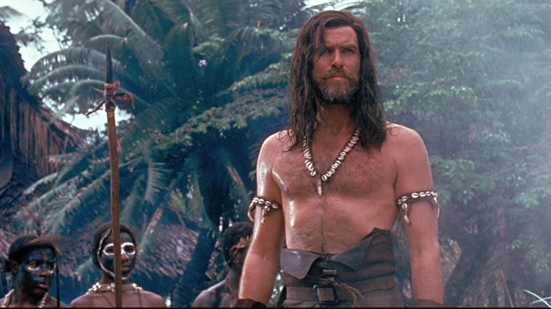 Crusoe is captured by natives in "Robinson Crusoe" (1997)