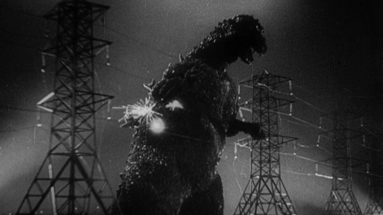 Godzilla destroying electrical towers