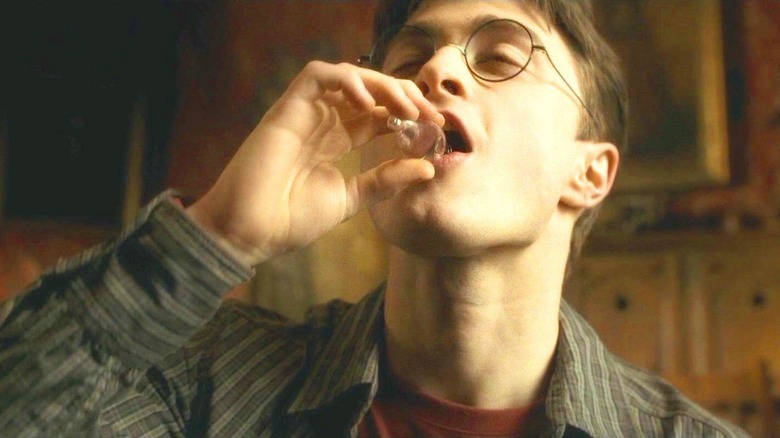 Harry drinking vial of Felix Felicis