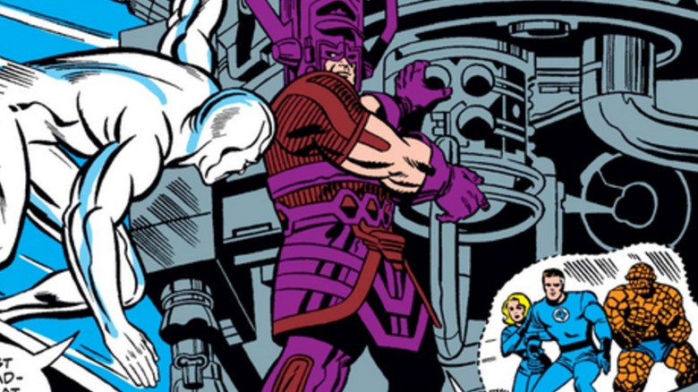 Galactus standing over the Silver Surfer and Fantastic Four